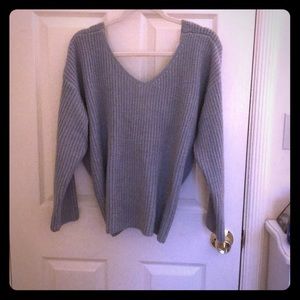 Tie back grey sweater.